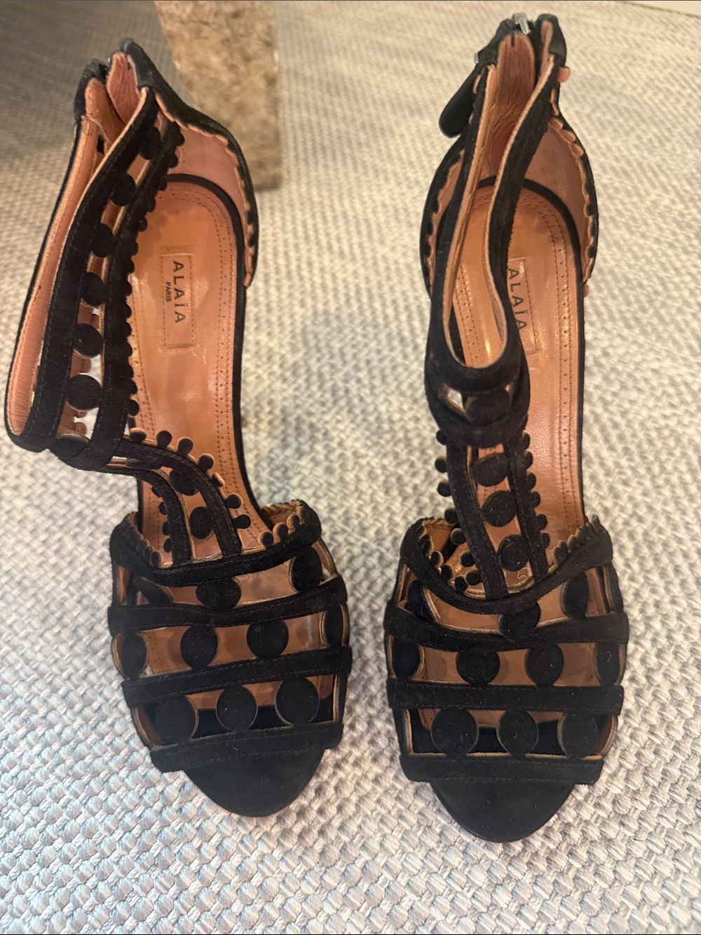 Alala Black Suede Cutout Ankle-Strap Heels with Pom Detail